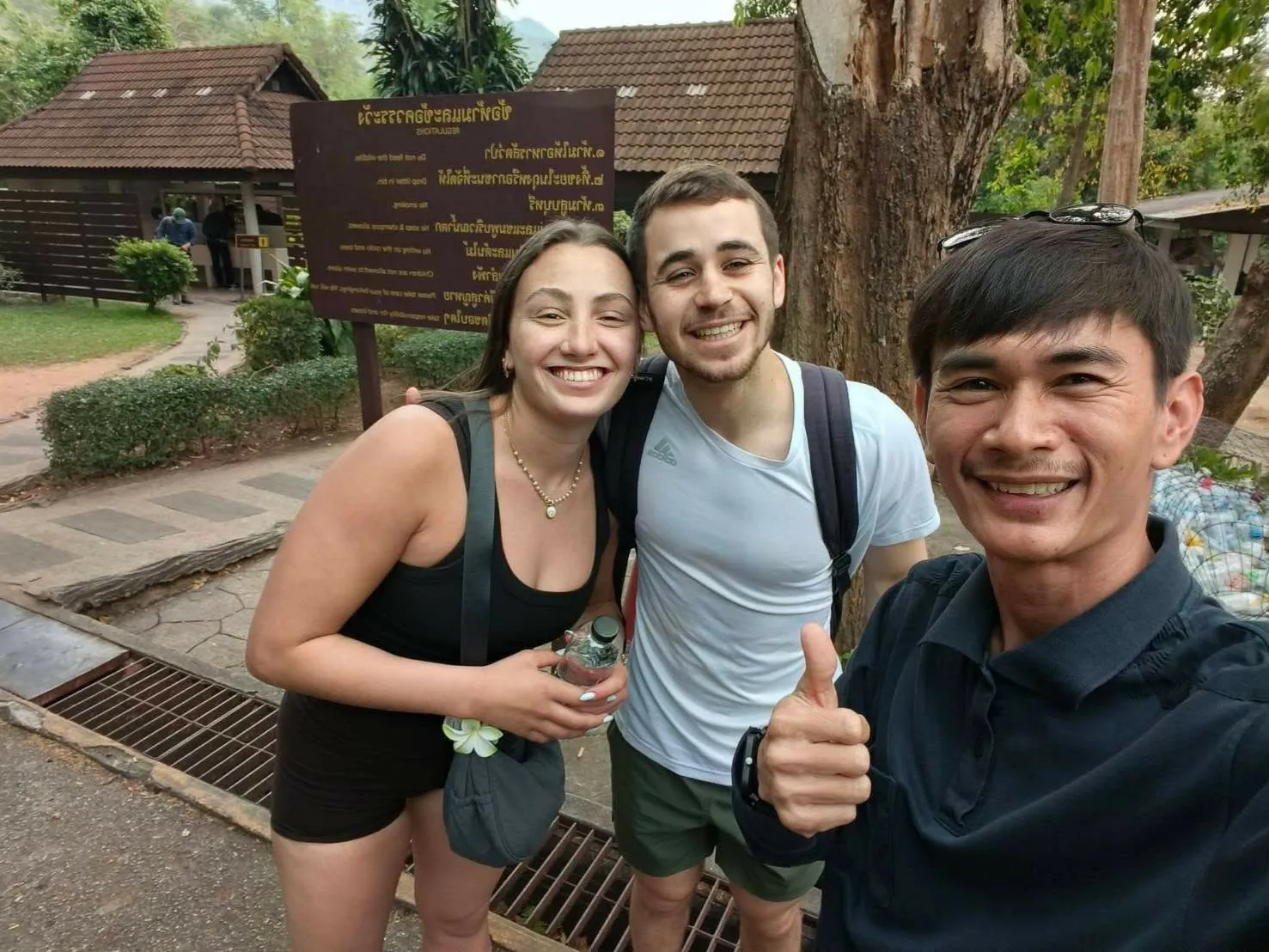 Nong with a young couple at the national park entrance