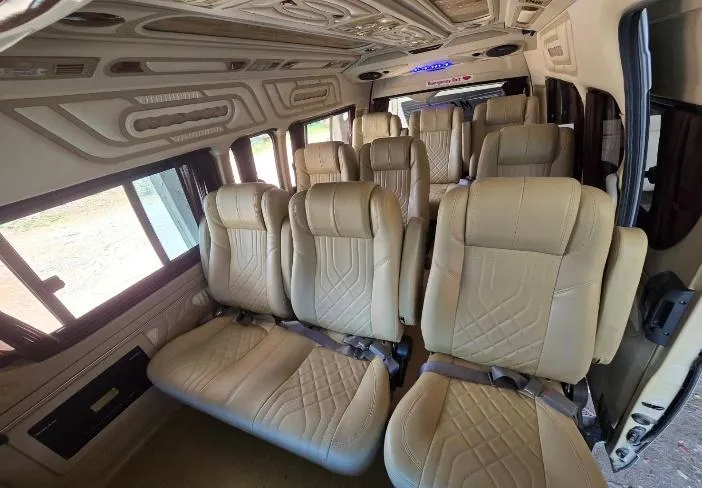 Van interior with cream leather seats and air-conditioning